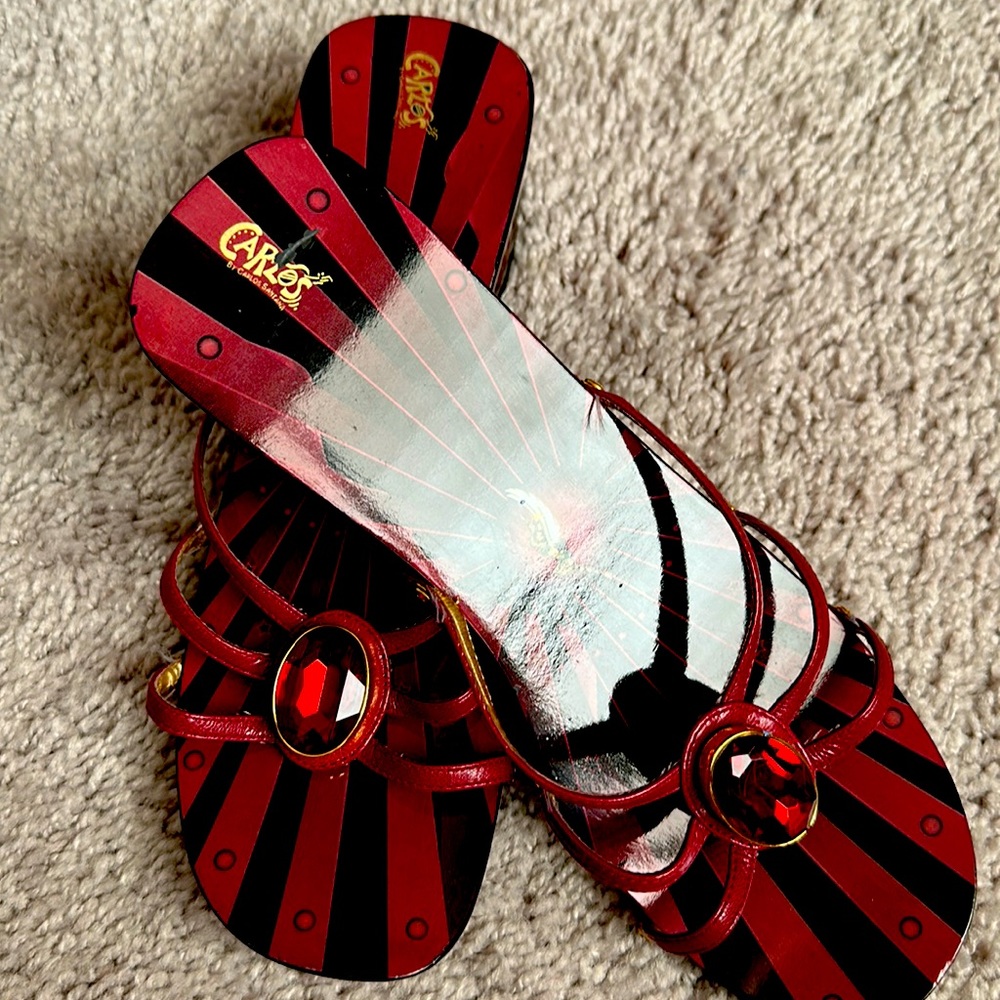 Brand new sandals by Carlos Santana size 7 true to size. Leather upper